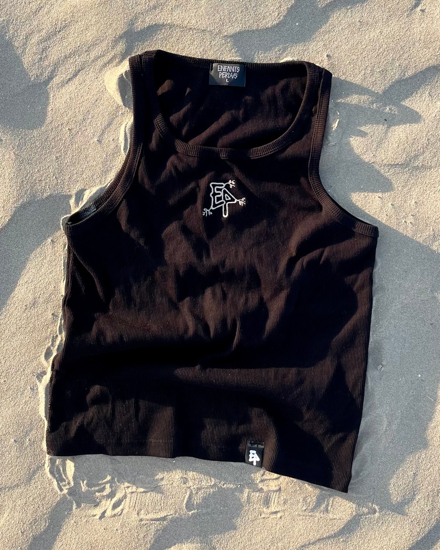 Canotta nera con ricamo beige