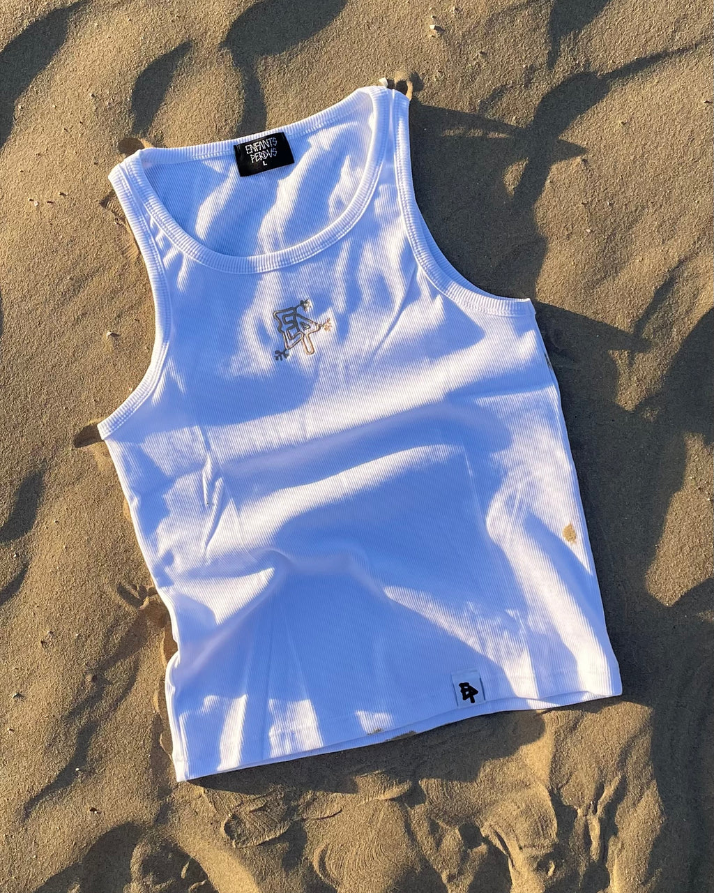 Canotta bianca con ricamo beige