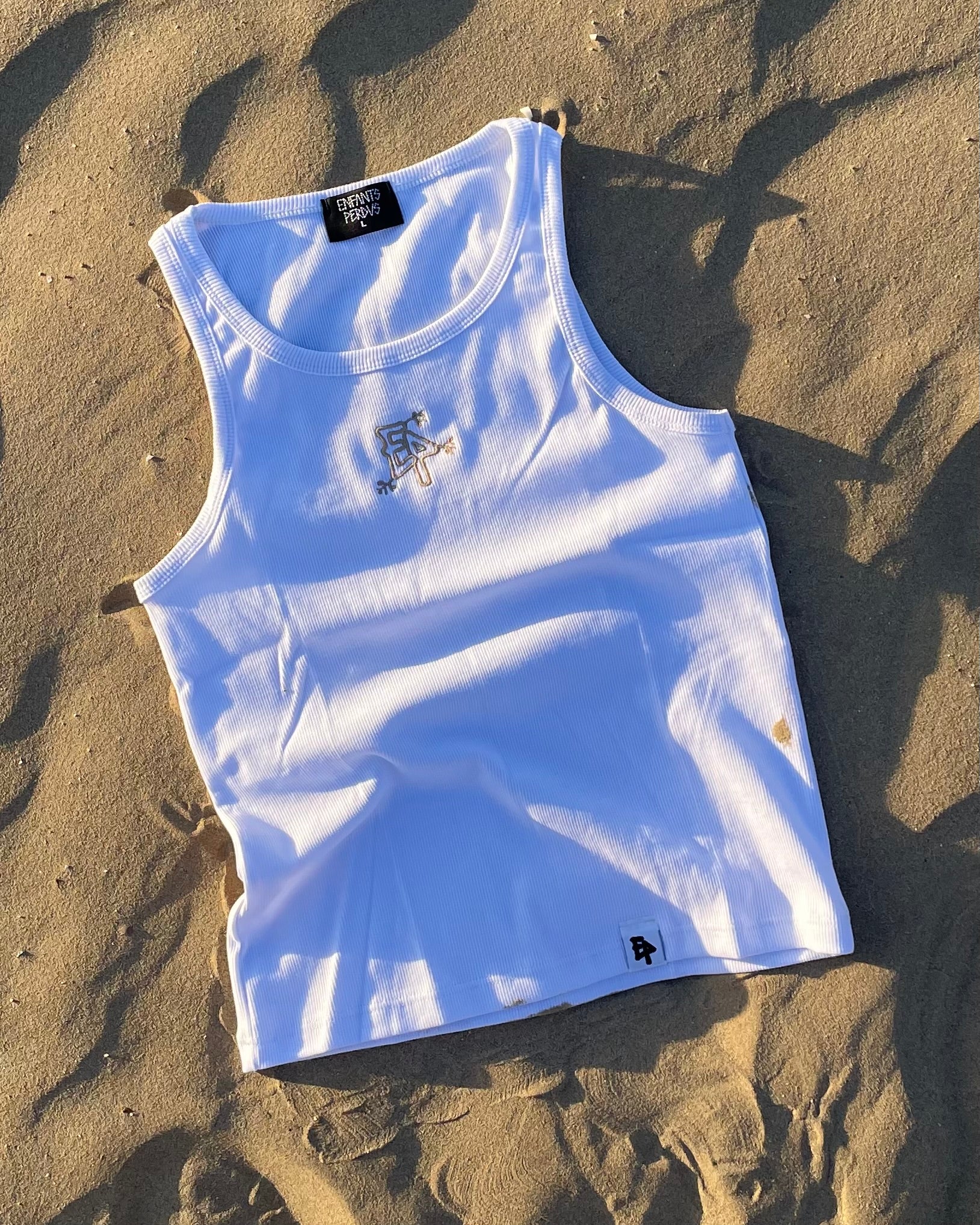 Canotta bianca con ricamo beige